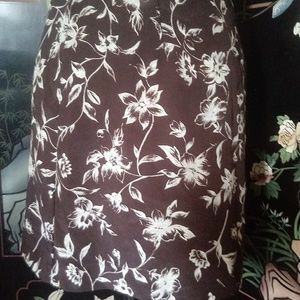 EXPRESS BROWN SKIRT W/WHITE FLORAL DESIGN